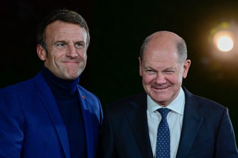 100722755-germanys-chancellor-olaf-scholz-r-welcomes-french-president-emmanuel-macron-for-a-wor